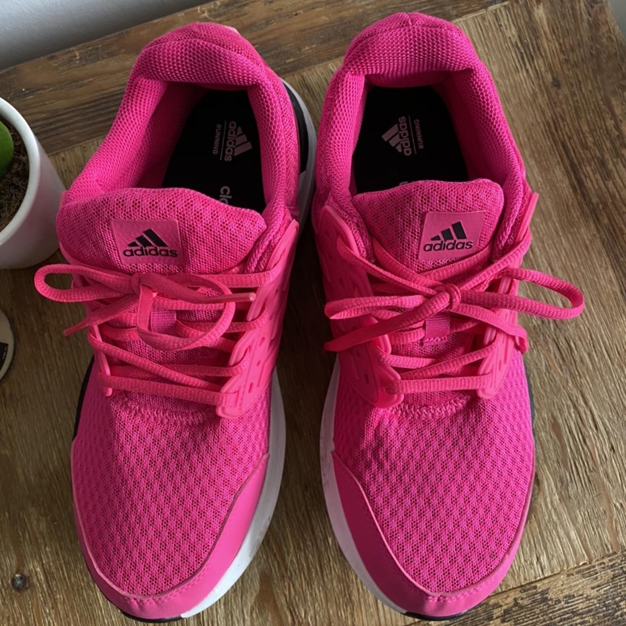 Hot pink Adidas running shoes. Worn once. True -