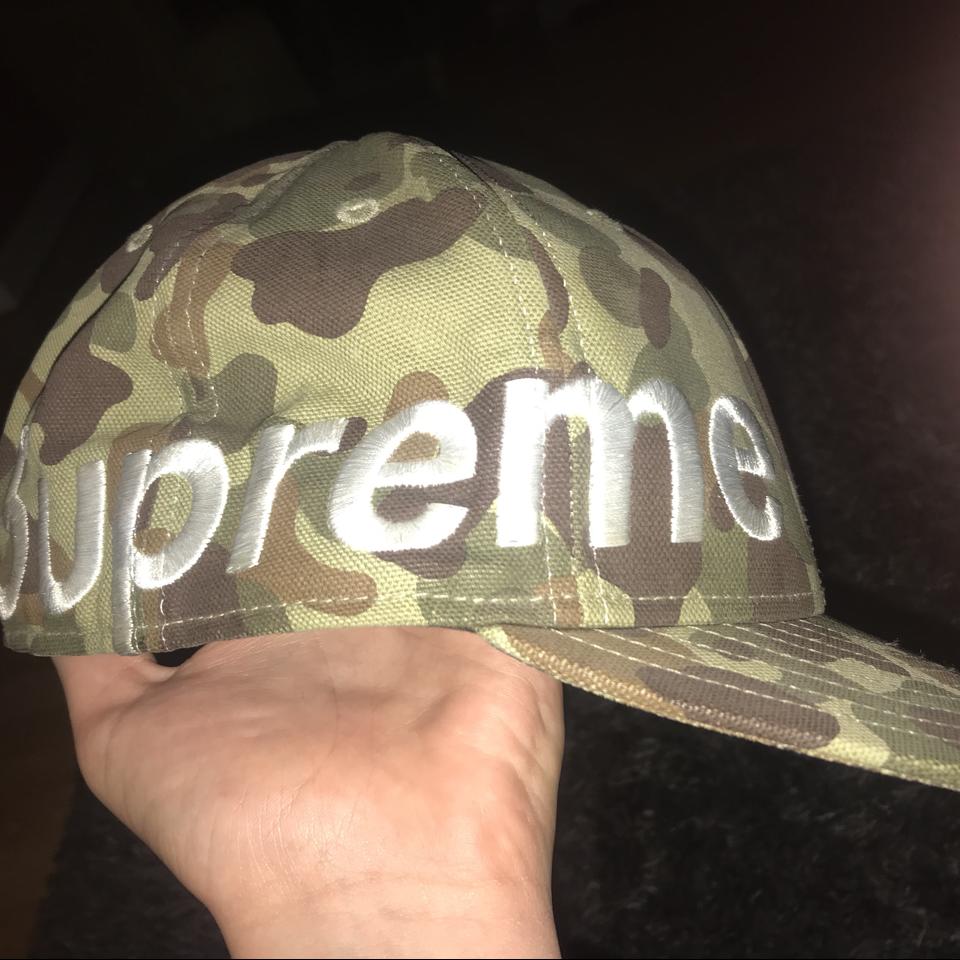 Supreme world famous camo side logo new era... - Depop