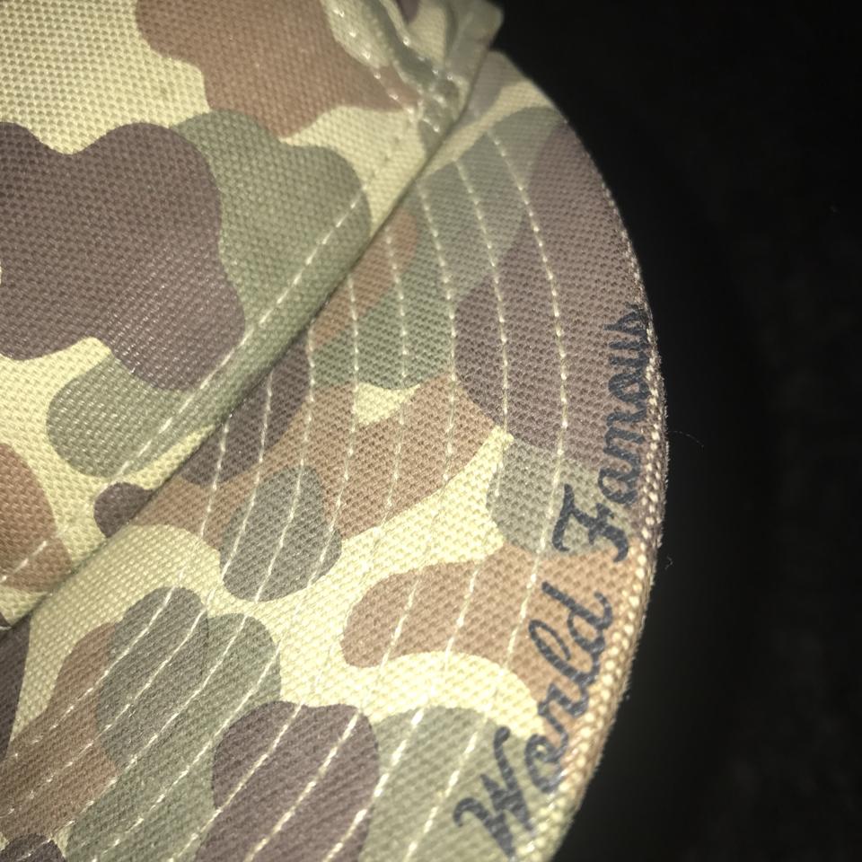 Supreme world famous camo side logo new era... - Depop