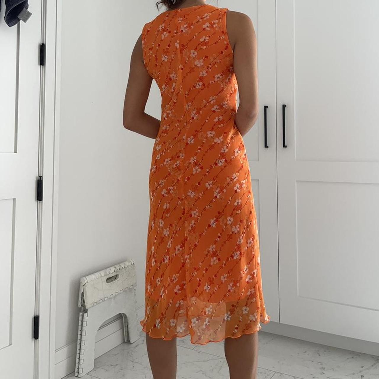 Vintage bright orange floral dress by La Belle!... Depop