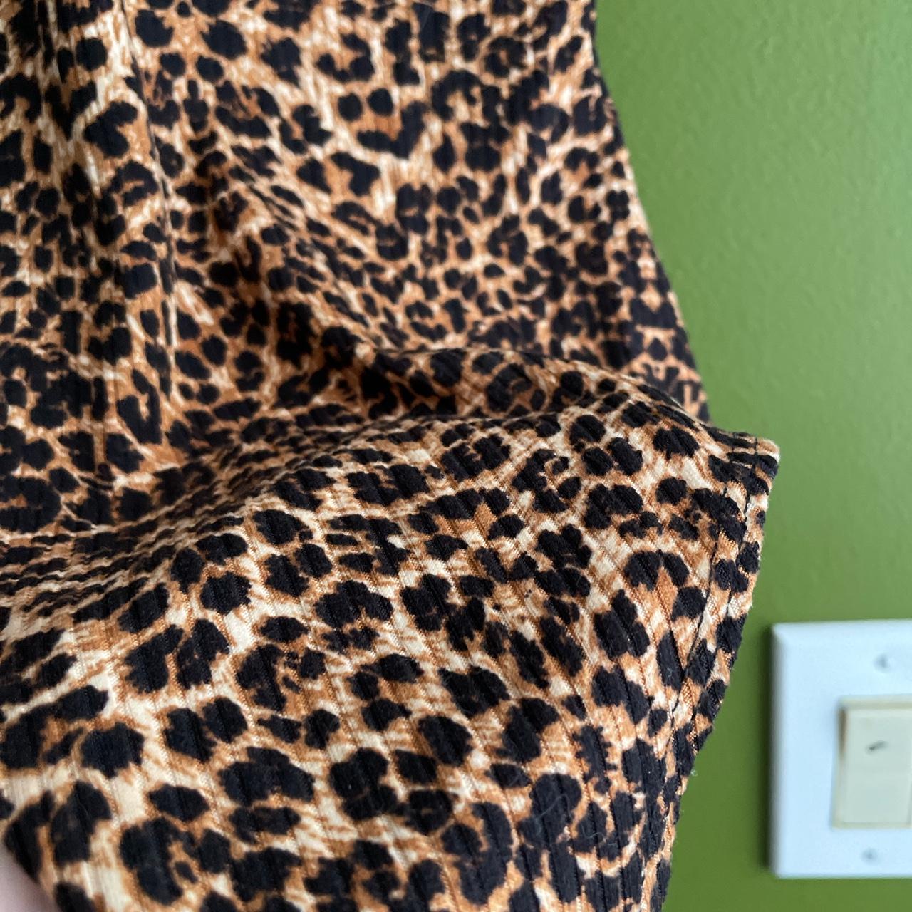 Ribbed leopard print bodysuit. V neck and back with... Depop