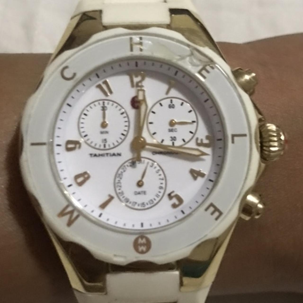 Used Michele white and gold jelly watch. Small crack