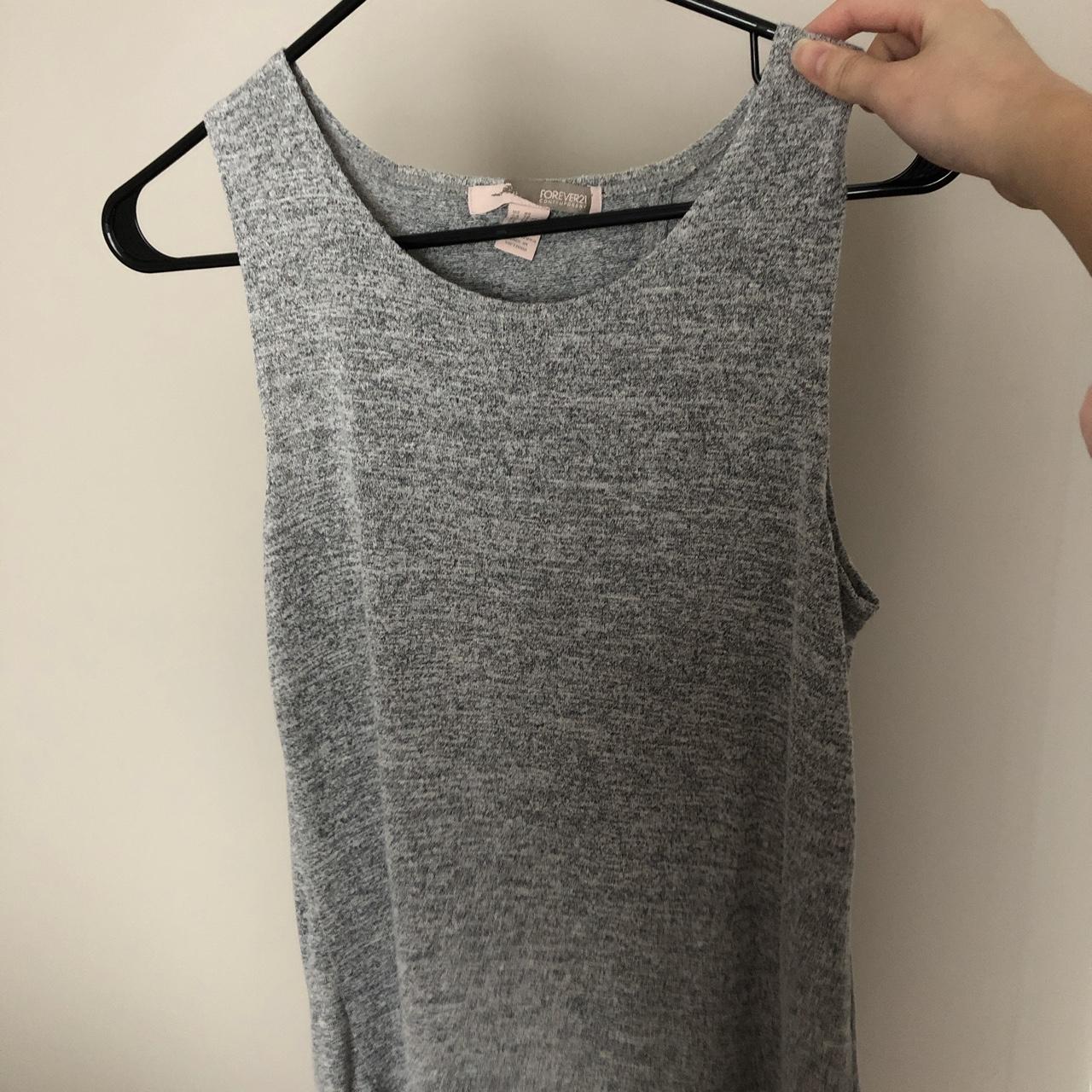 Very soft grey tank top with a slit in the back from... - Depop