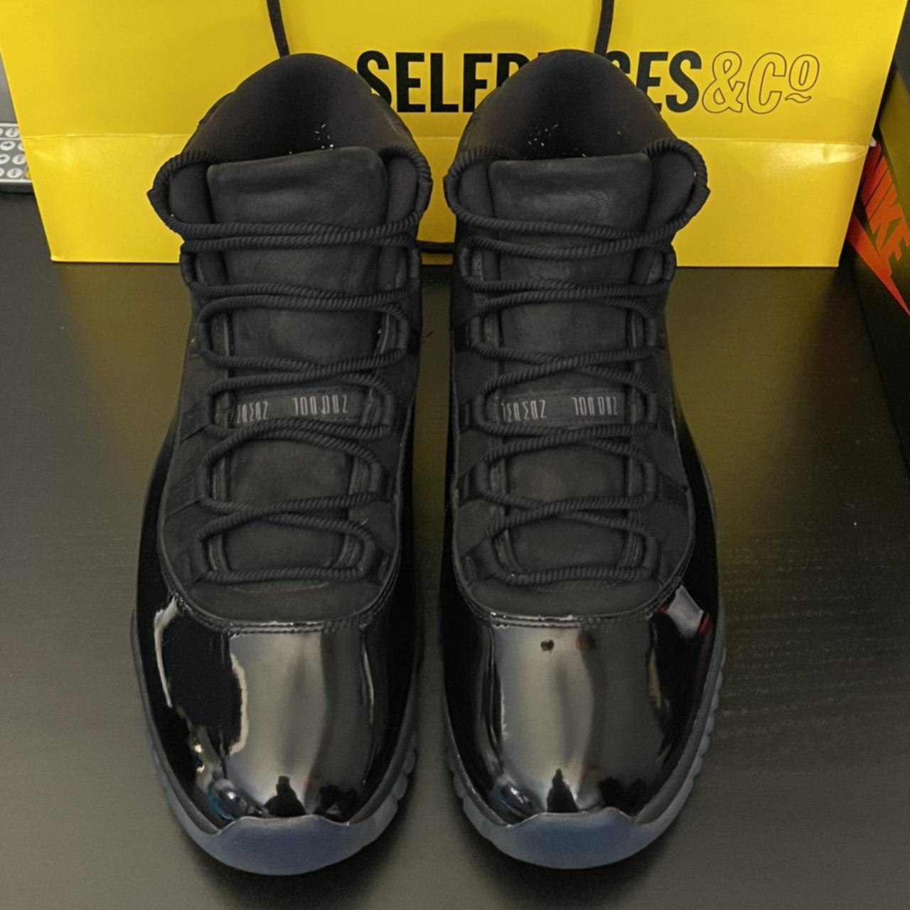 black on black jordan 11