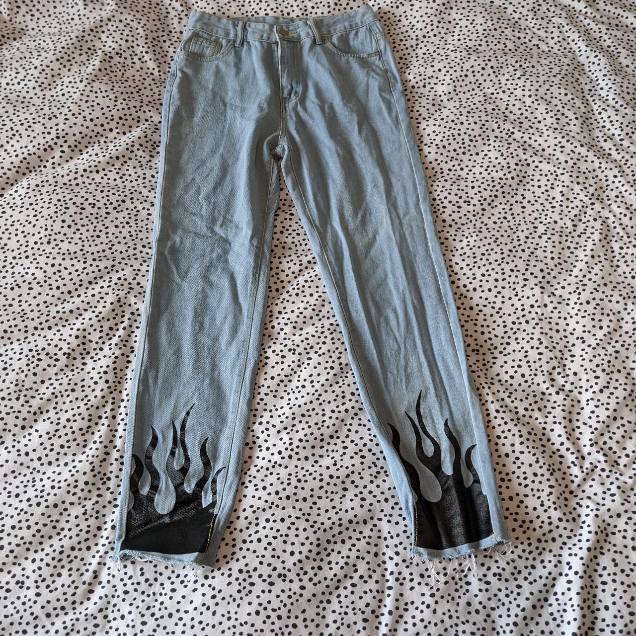 Light blue straight-leg jeans with painted black... - Depop