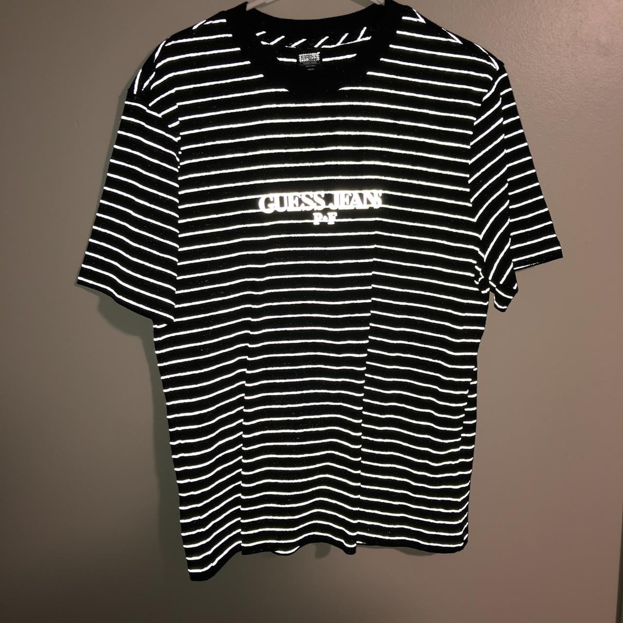 Places Faces X Guess: The Latest Collaboration Date Guess x Places and Faces 3M reflective striped t... - Depop