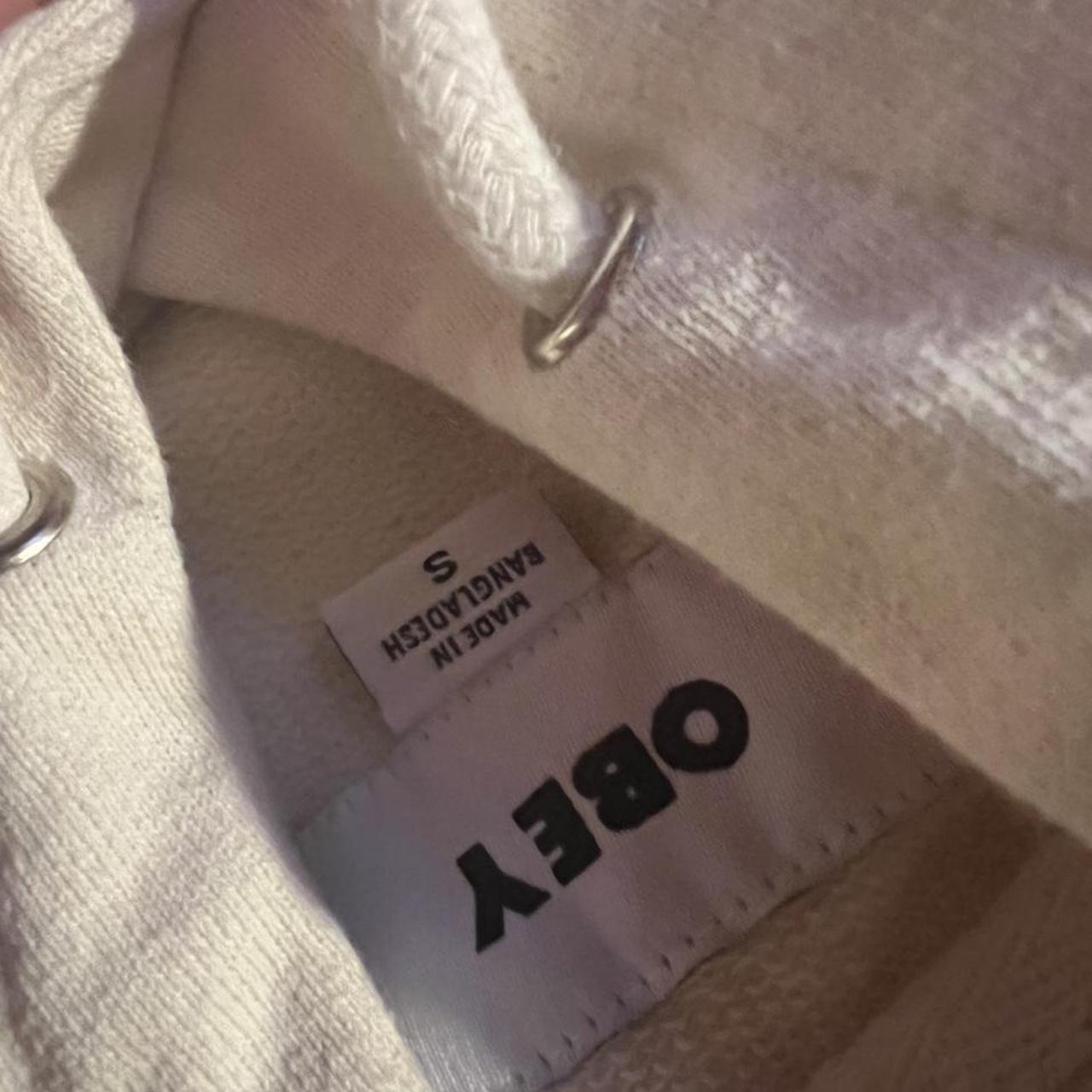 Cream Obey Hoodie Like new only wore once Depop