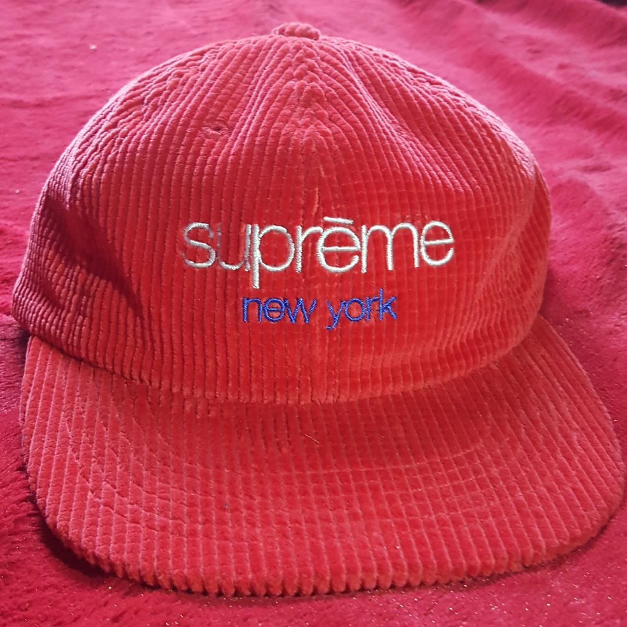 red supreme hat