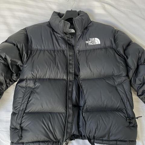 dark grey north face puffer