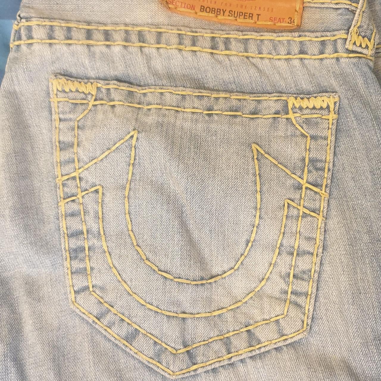 True religion store jeans yellow stitching