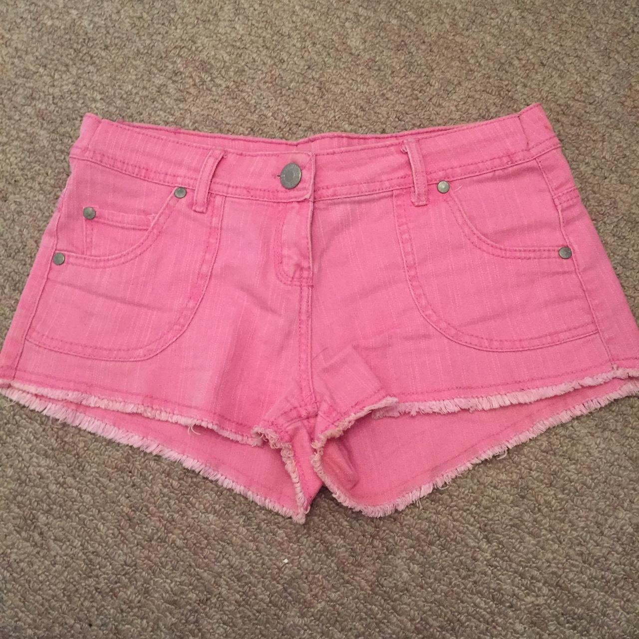 Pink denim shorts with pockets and rip styled edge.... - Depop