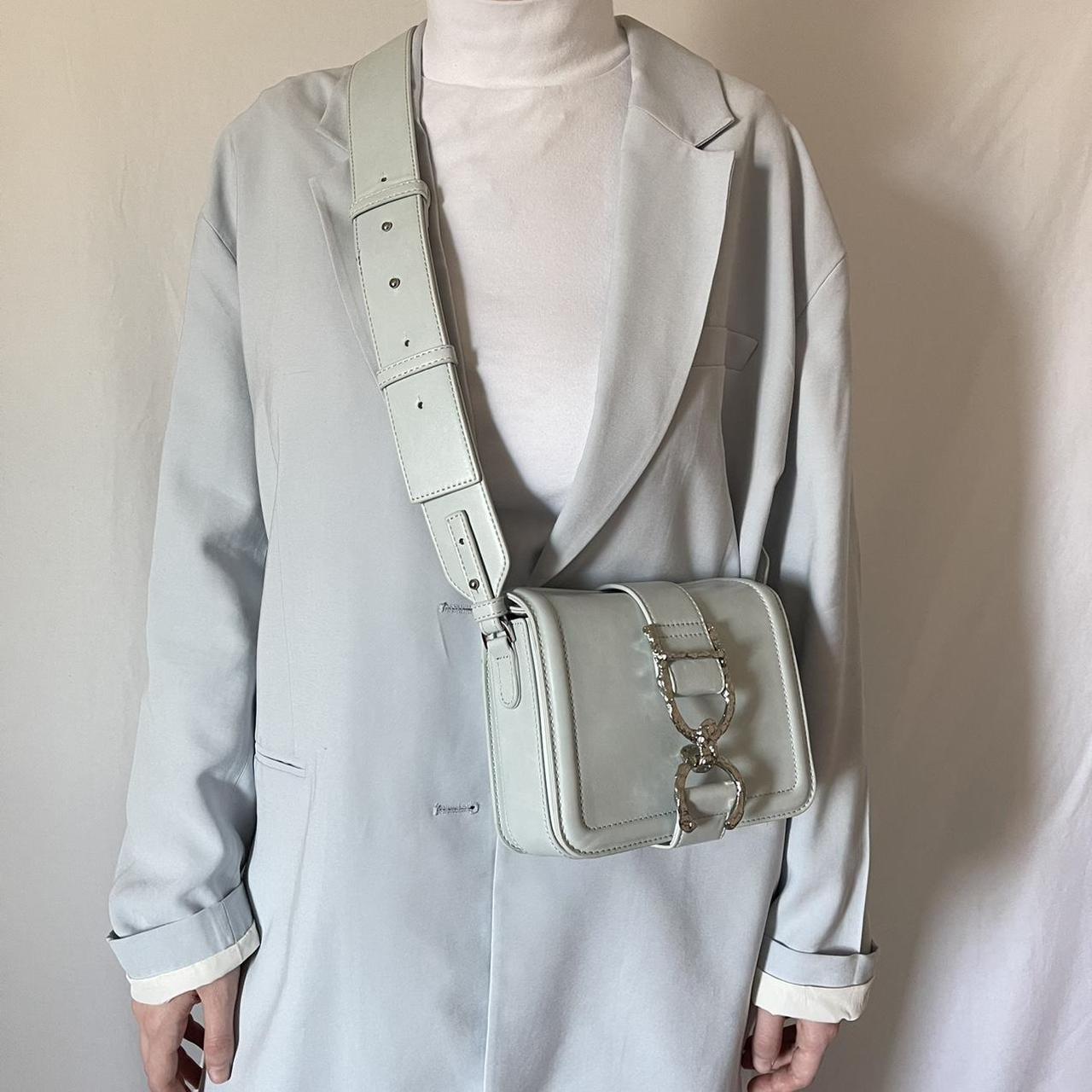 Pale Blue Crossbody Bag from bought it from... Depop