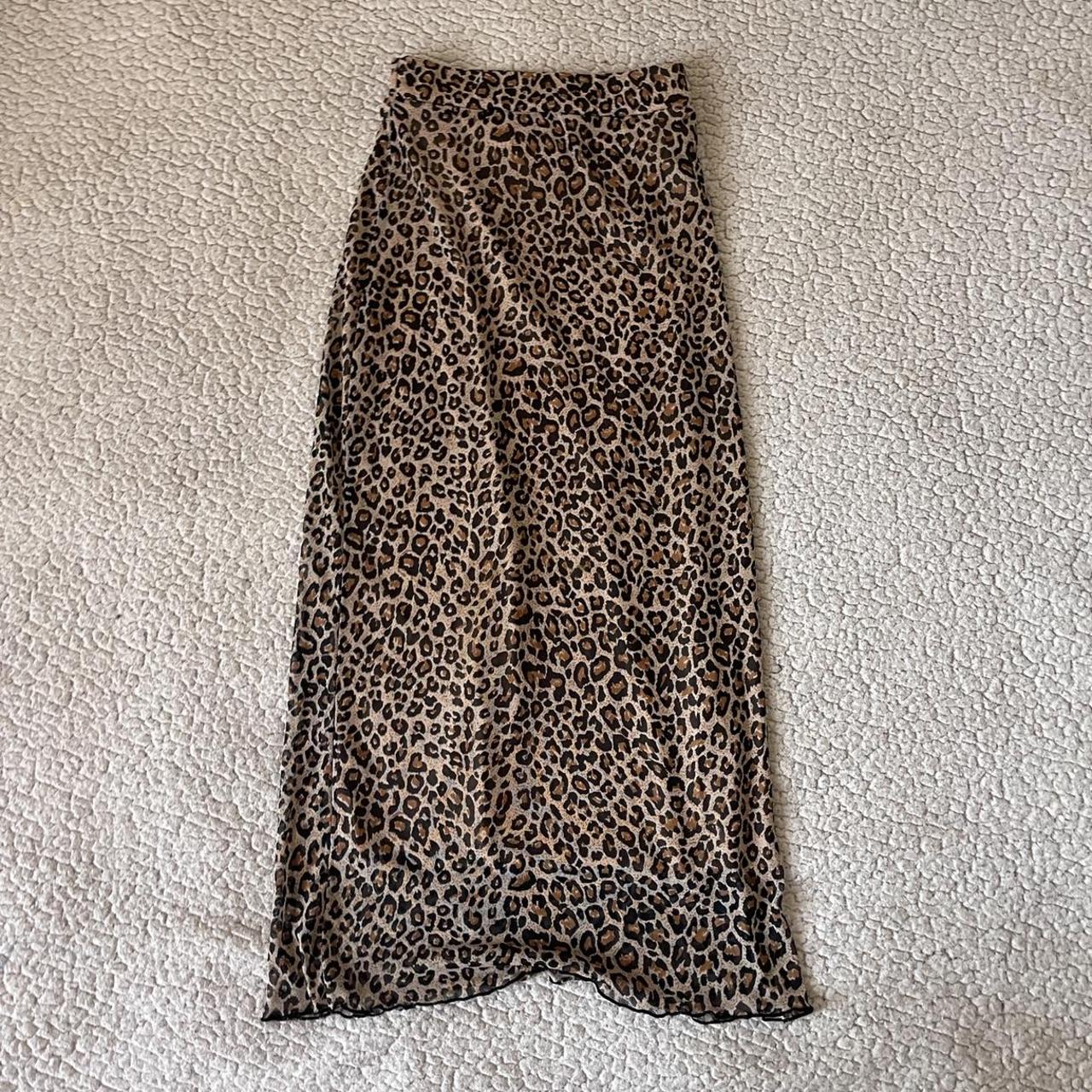 Cute little midi mesh cheetah print skirt. Has an... - Depop