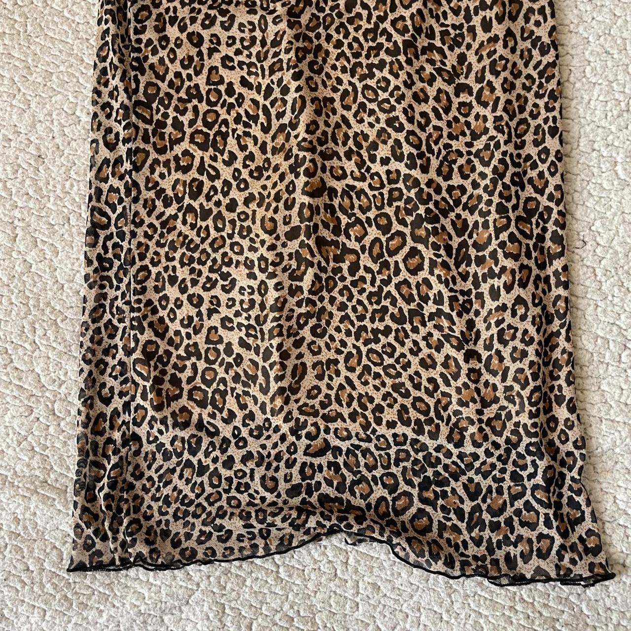 Cute little midi mesh cheetah print skirt. Has an... - Depop