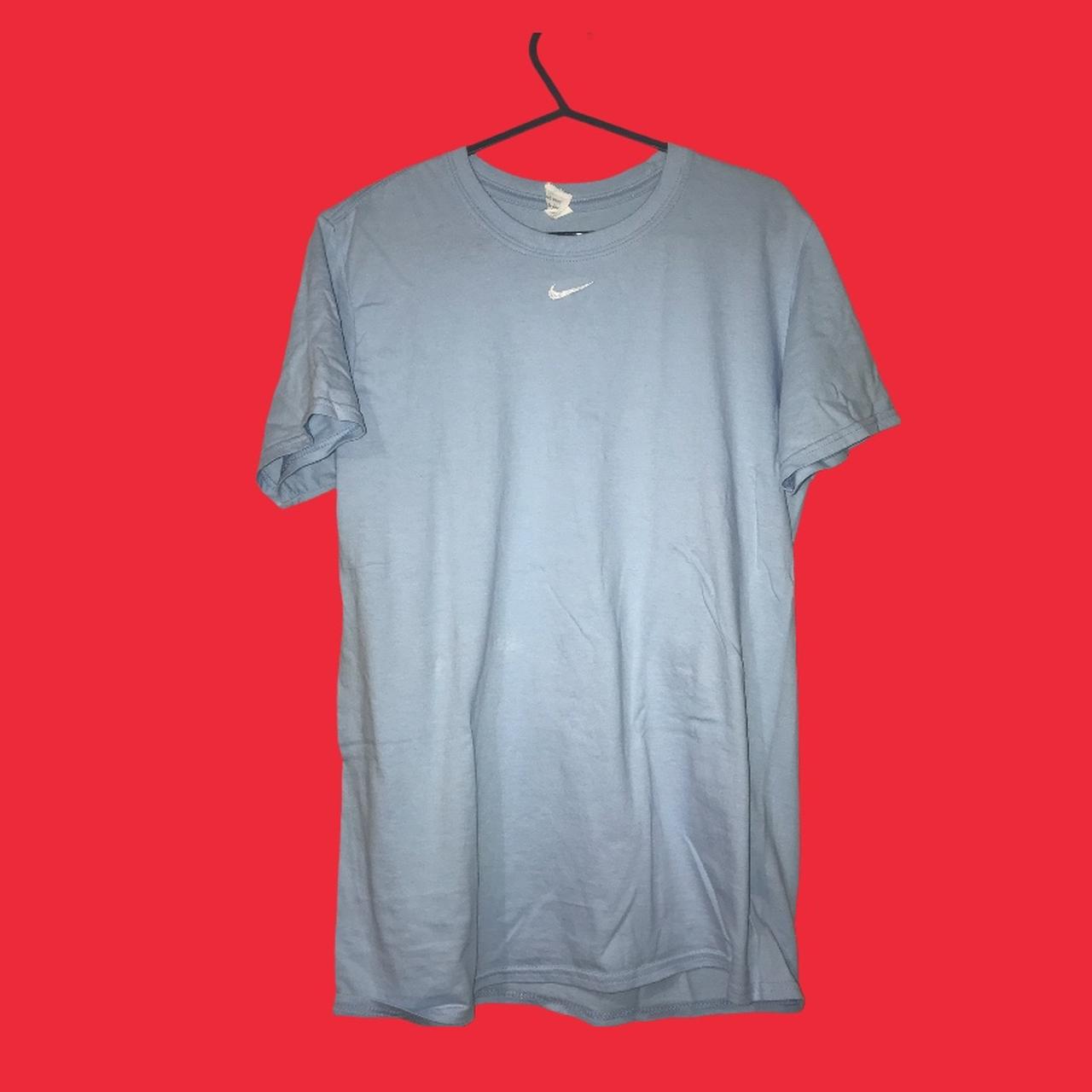 Sky blue cotton tshirt with a white tick embroidered... - Depop