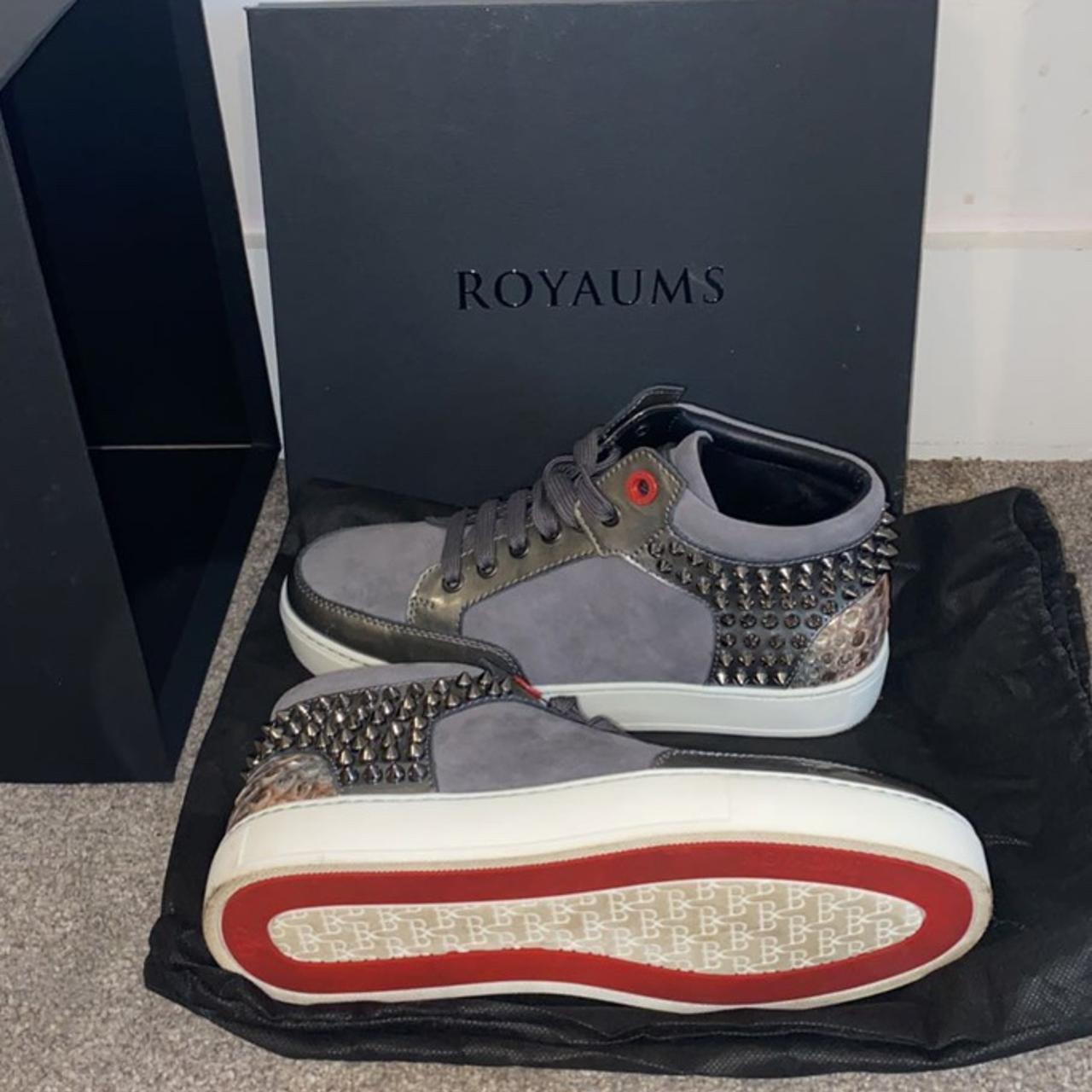 Royaums studded trainers with red bottoms comes