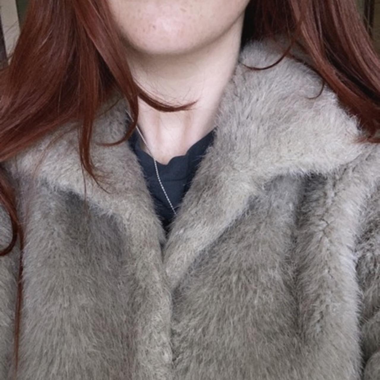 amazing grey faux fur coat, has an option for high… - Depop