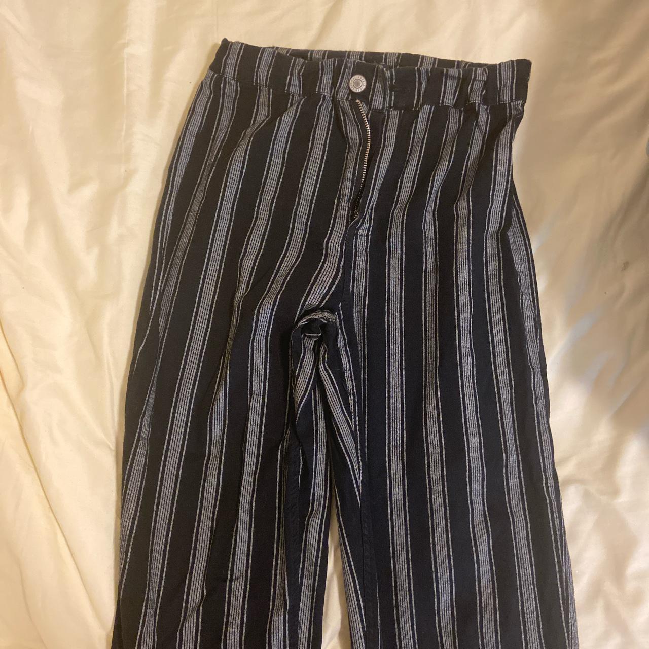 The classic brandy pinstripe pants! Great condition... - Depop