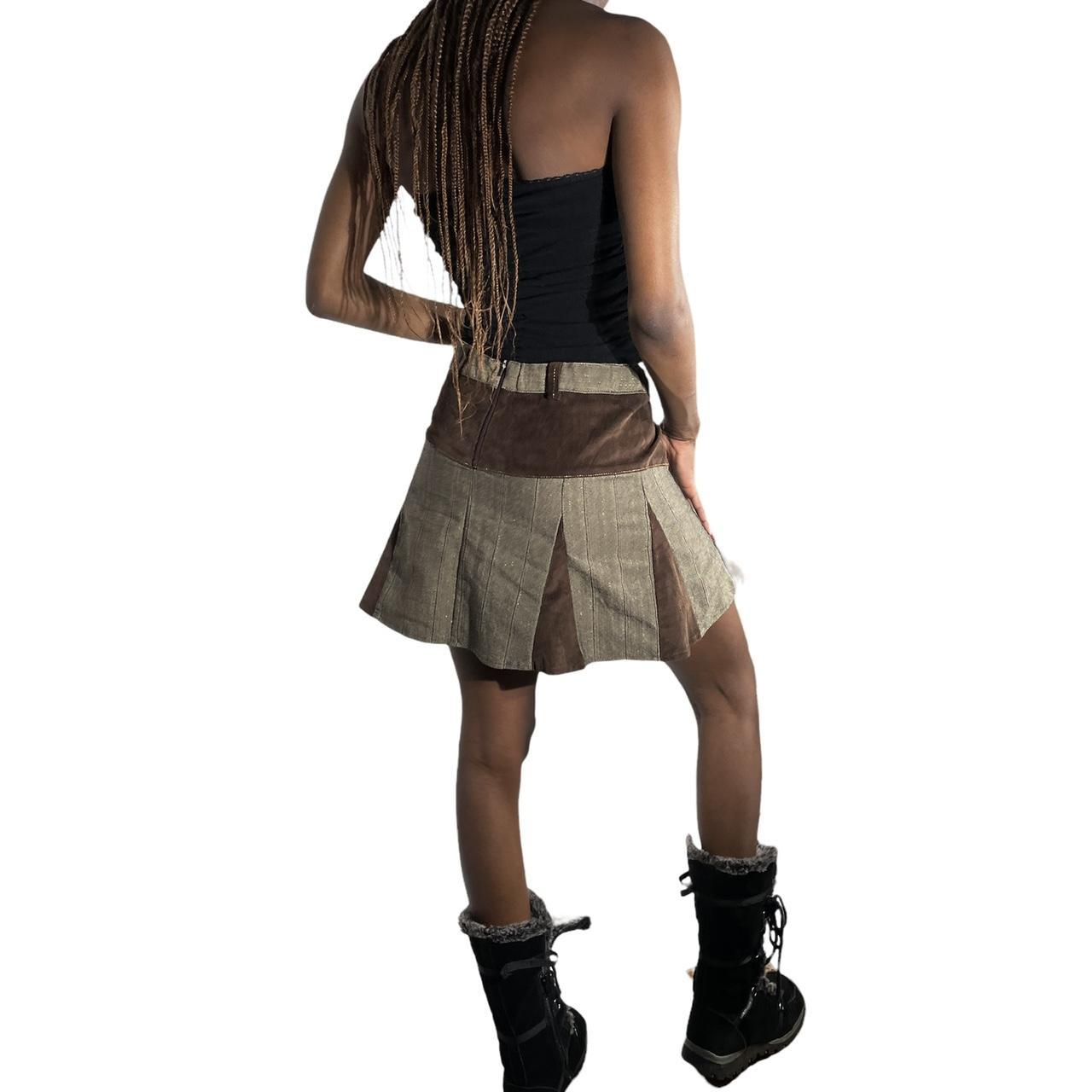 Cutest lil baby doll skirt 🏹 featuring heart stud... Depop