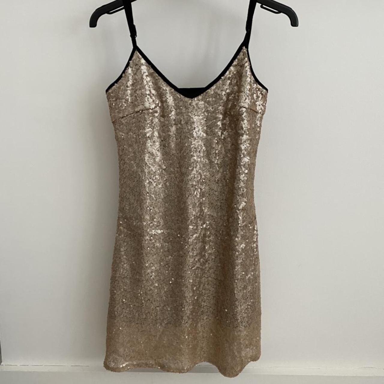 golden sequin dress with black trim. only worn once... - Depop