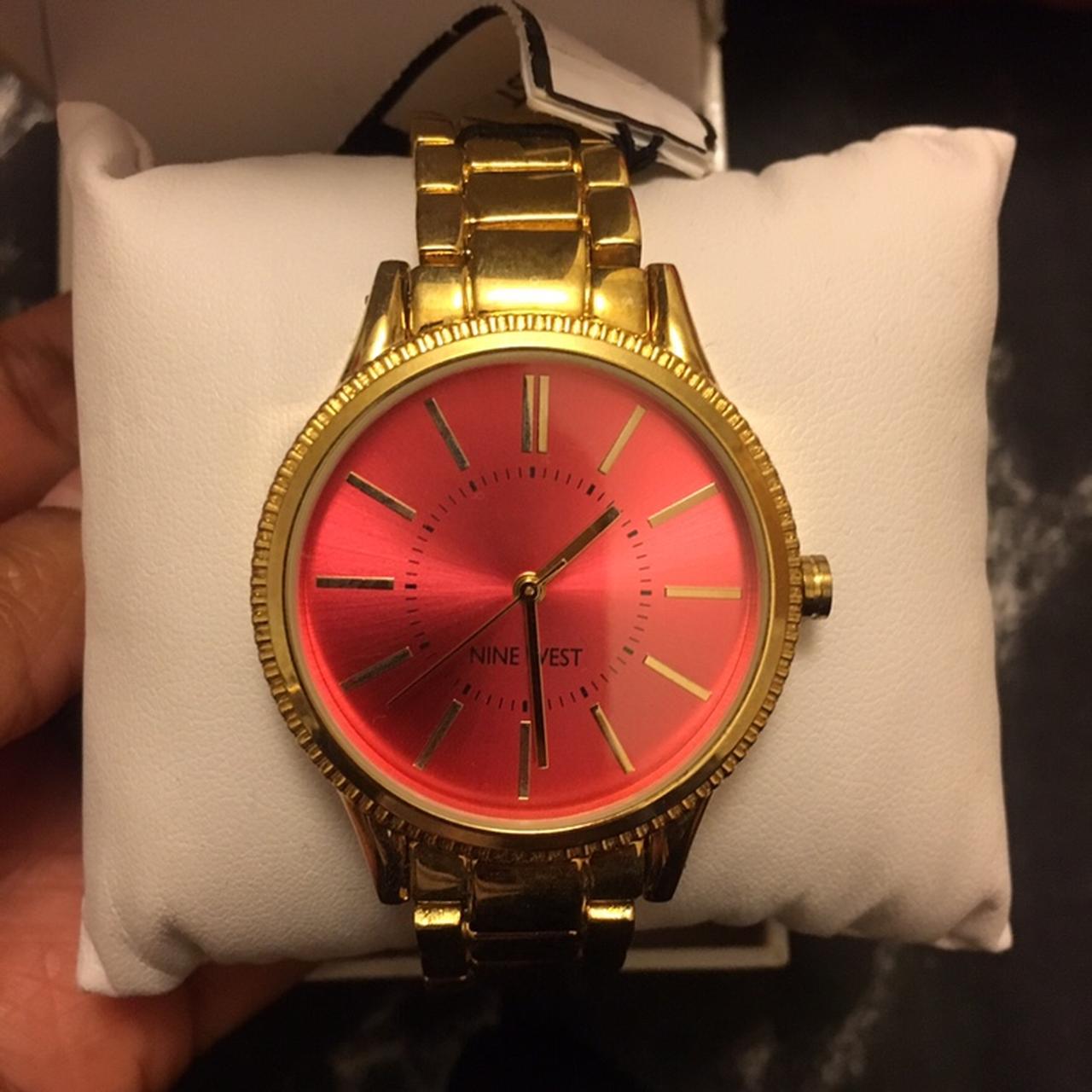 Gold Nine West watch with pink Given as a