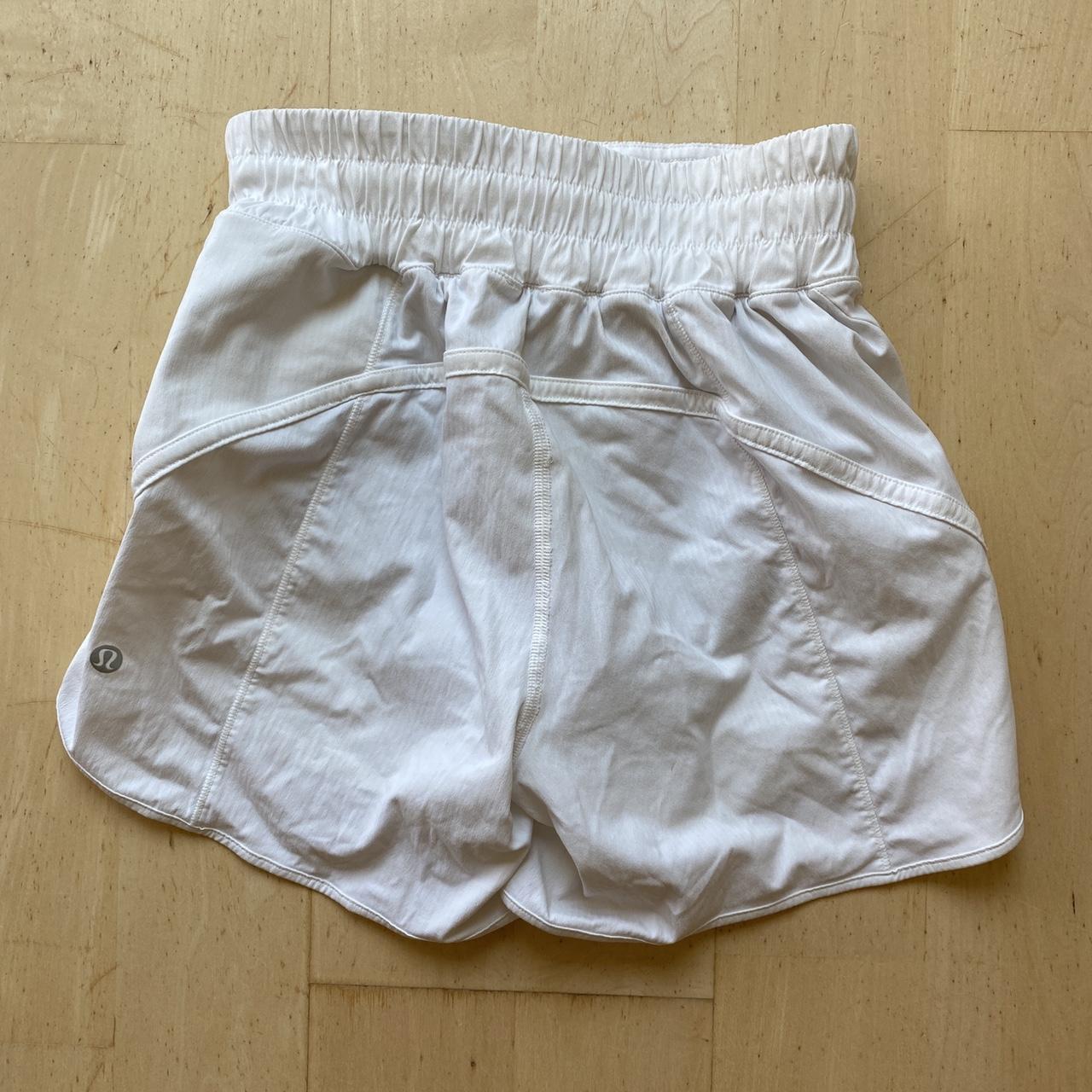 white lululemon tracker shorts great condition size... Depop