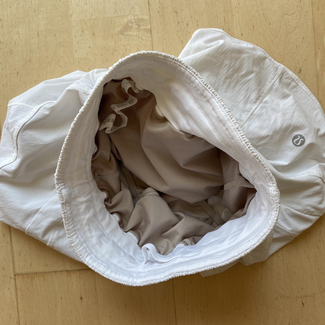 white lululemon tracker shorts great condition size... Depop