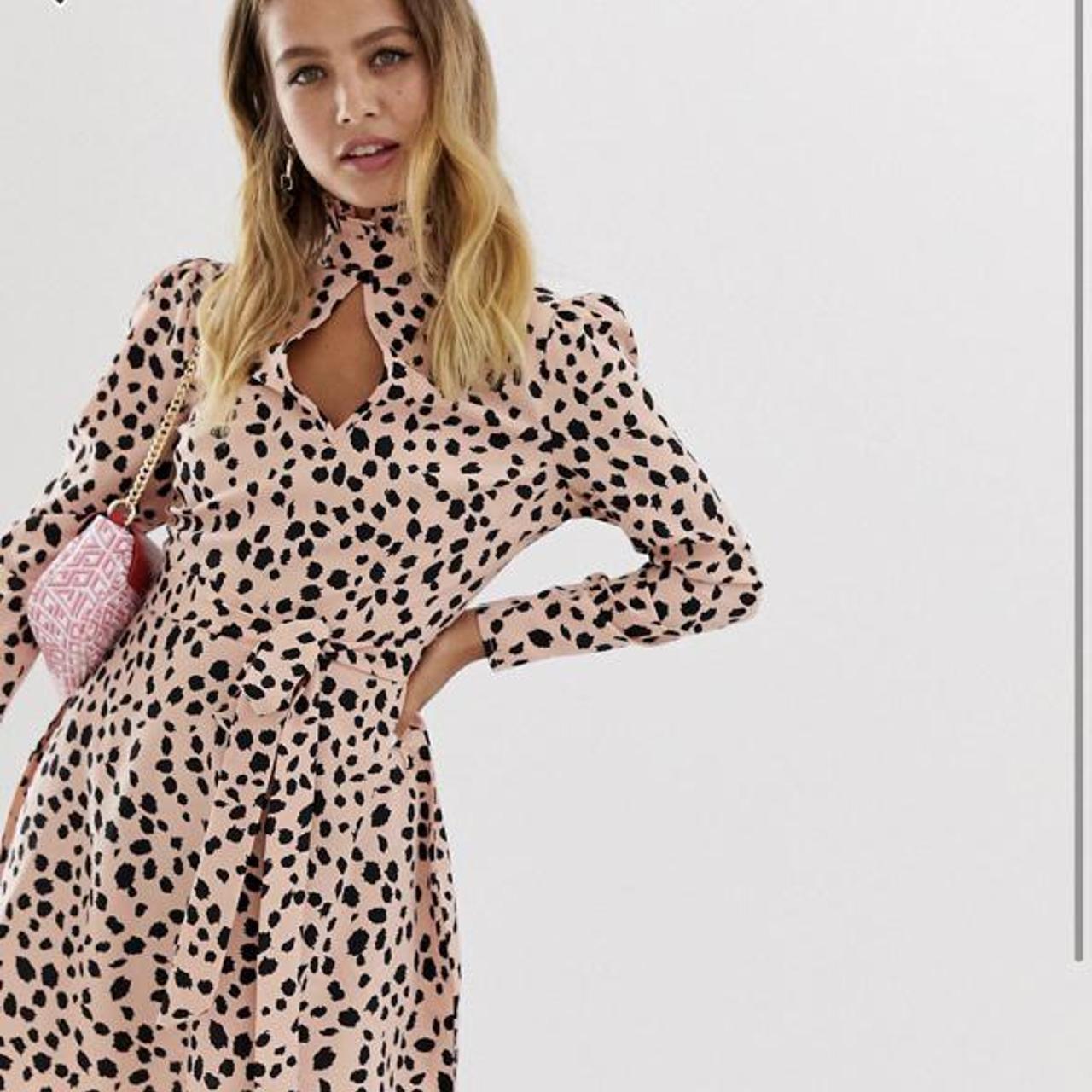 Wednesday’s girl polka dot pink mini dress,