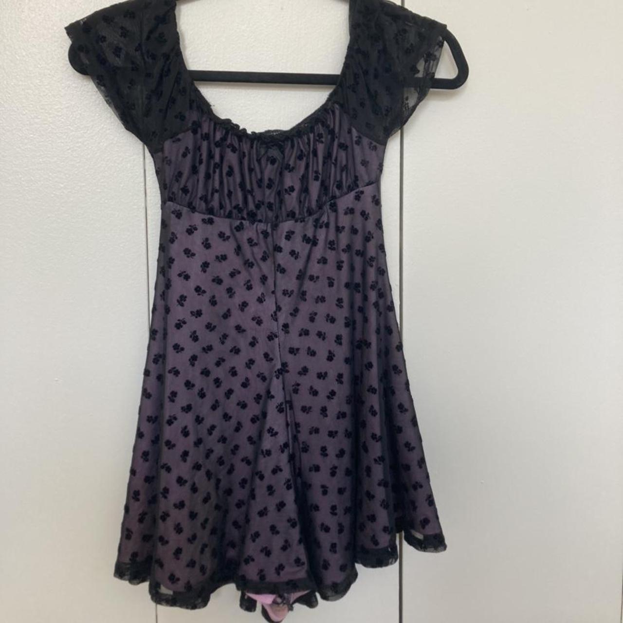 Urban outfitters purple and black romper Size xxs Depop