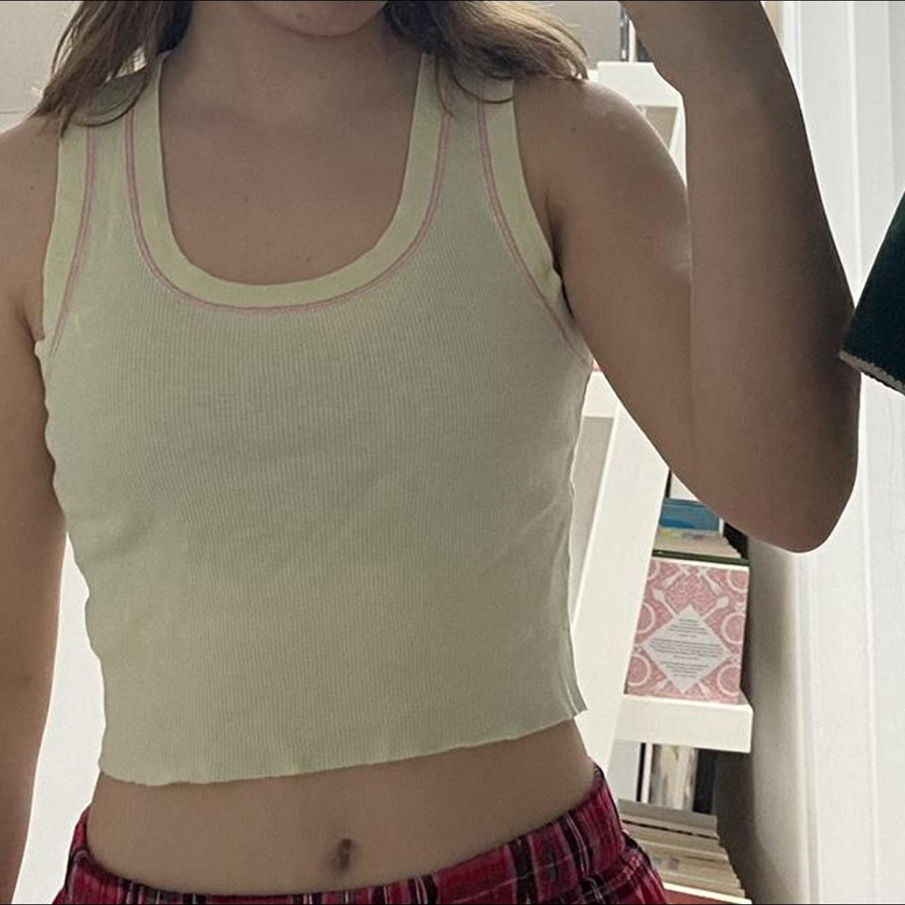 green brandy melville connor tank with pink contrast... Depop