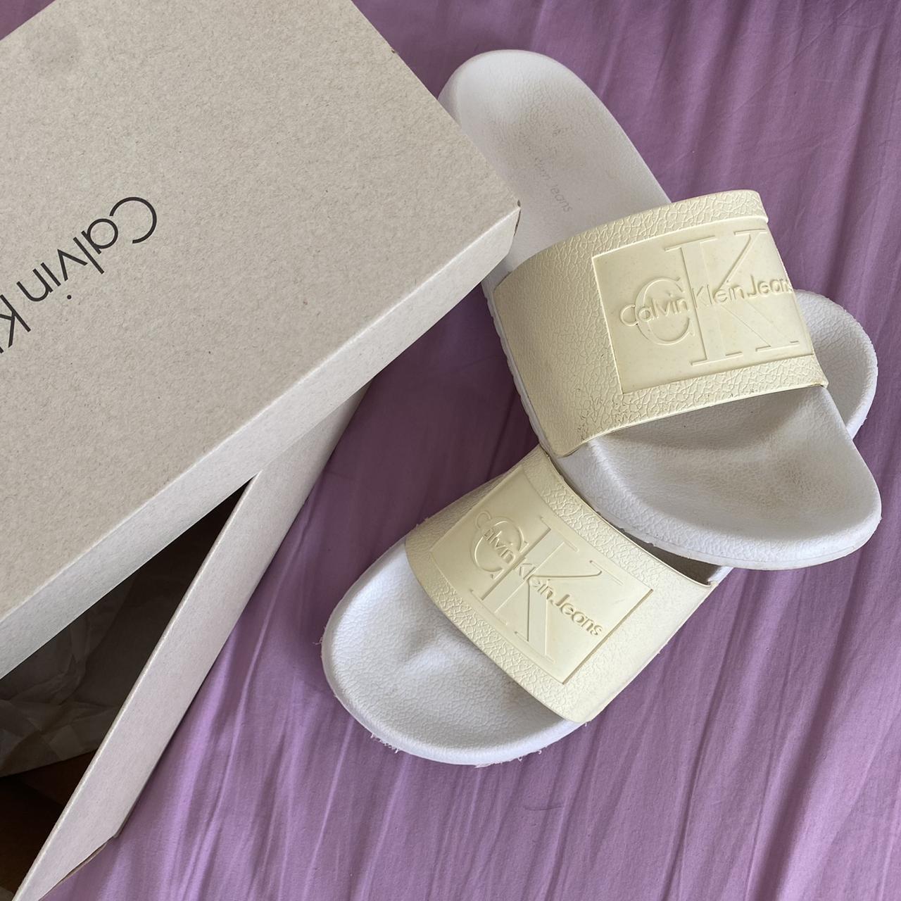 Calvin Klein white jelly sliders comes with Depop