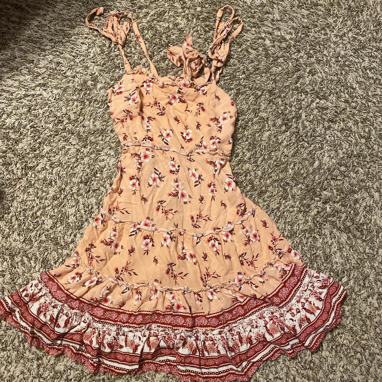 Adorable pink dress no sleeves, it ties into bows... Depop