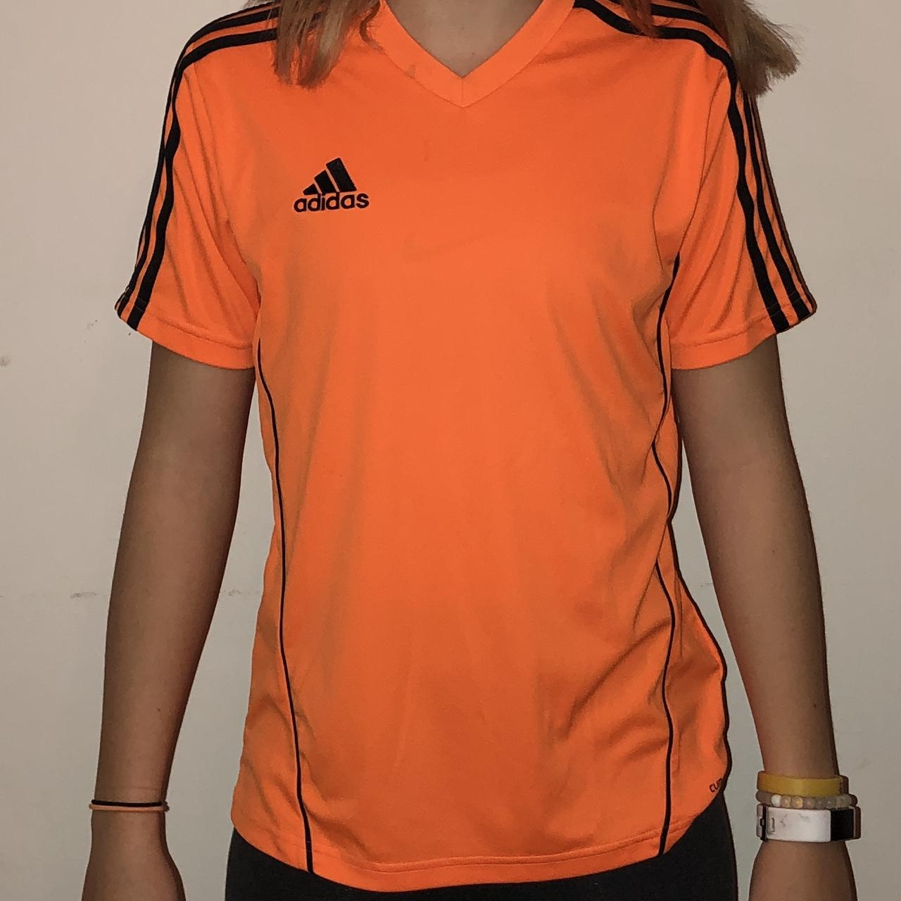 This is a gently used orange Adidas