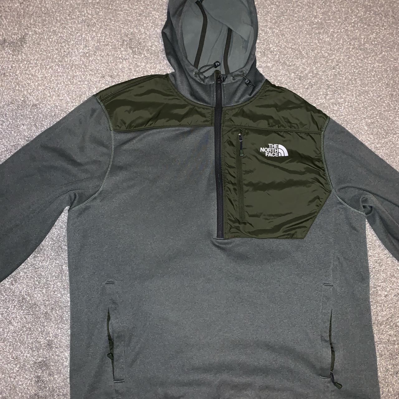 The North Face green half zip hoodie with a pocket... - Depop