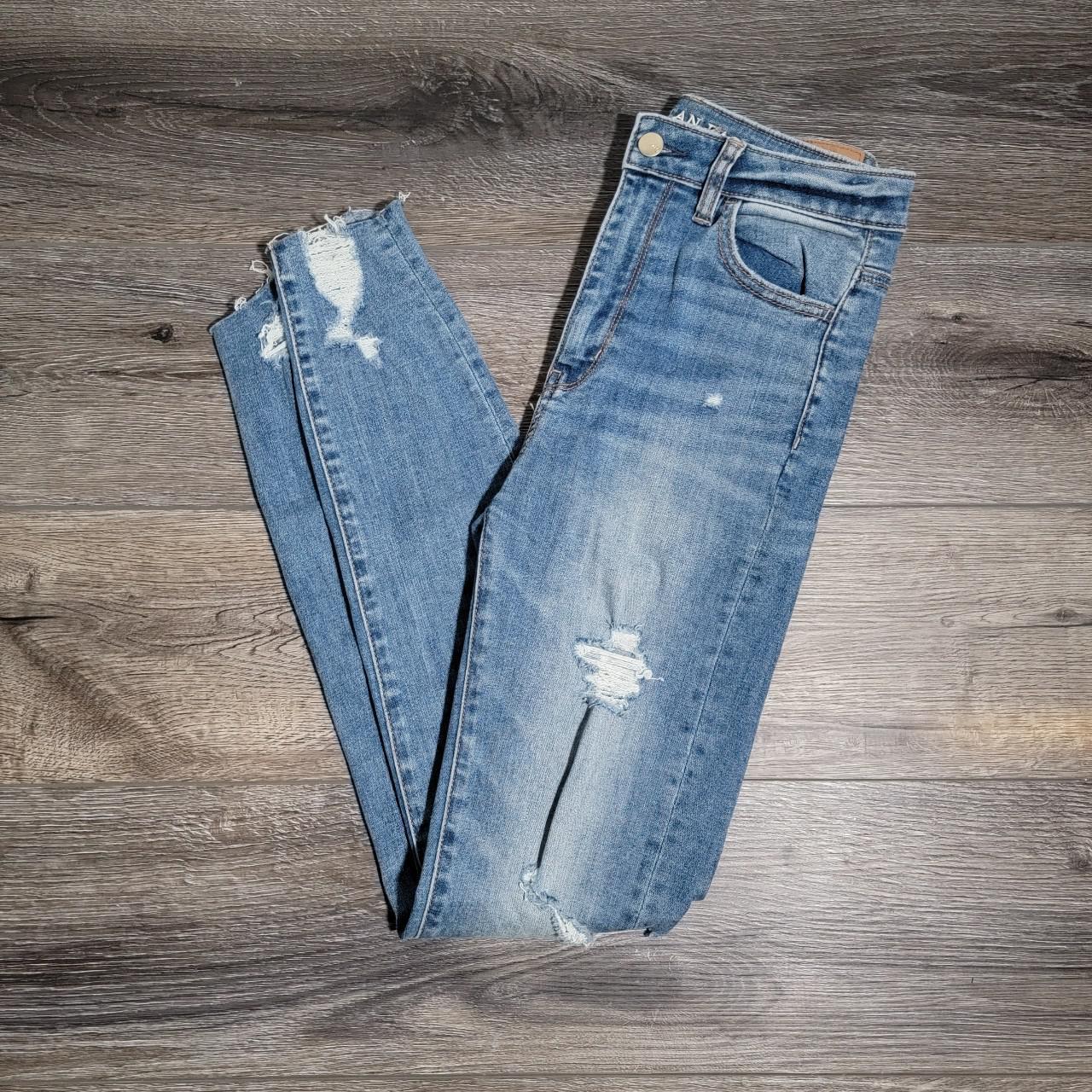 The ripped super stretch jeans by American Eagle... - Depop