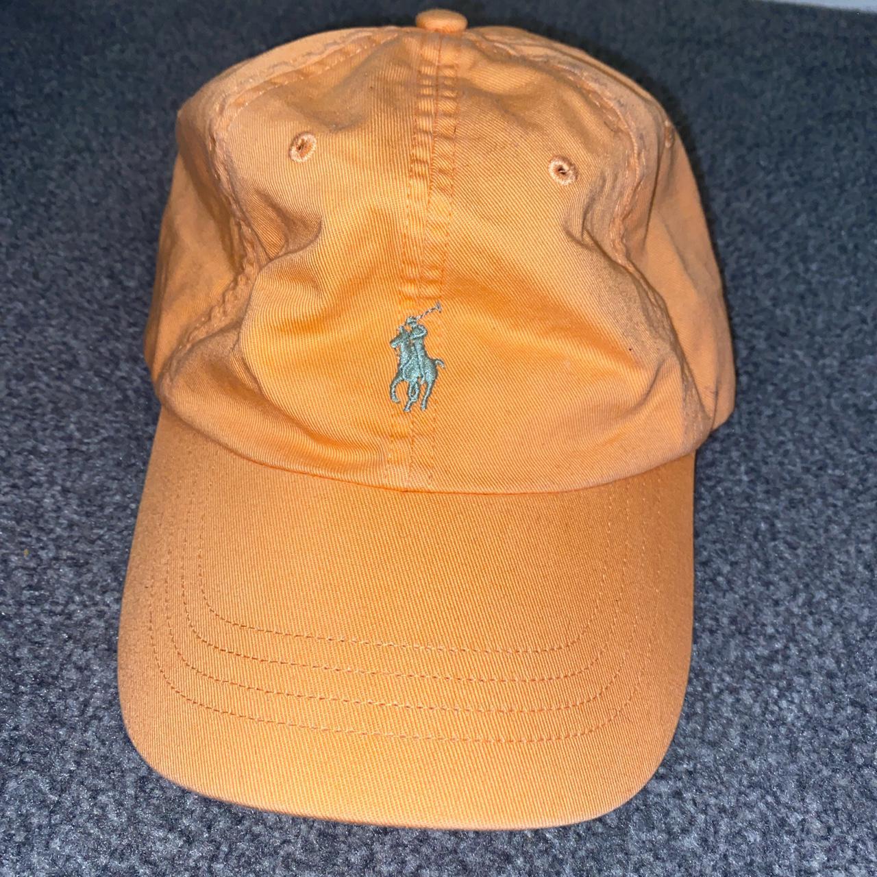 peach polo hat
