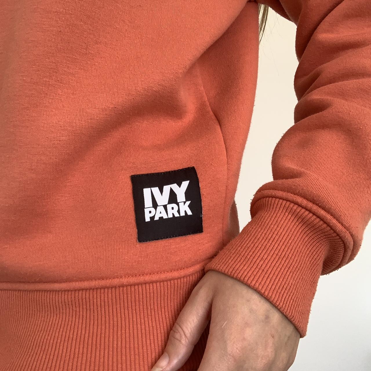 Ivy park 2024 orange sweatshirt