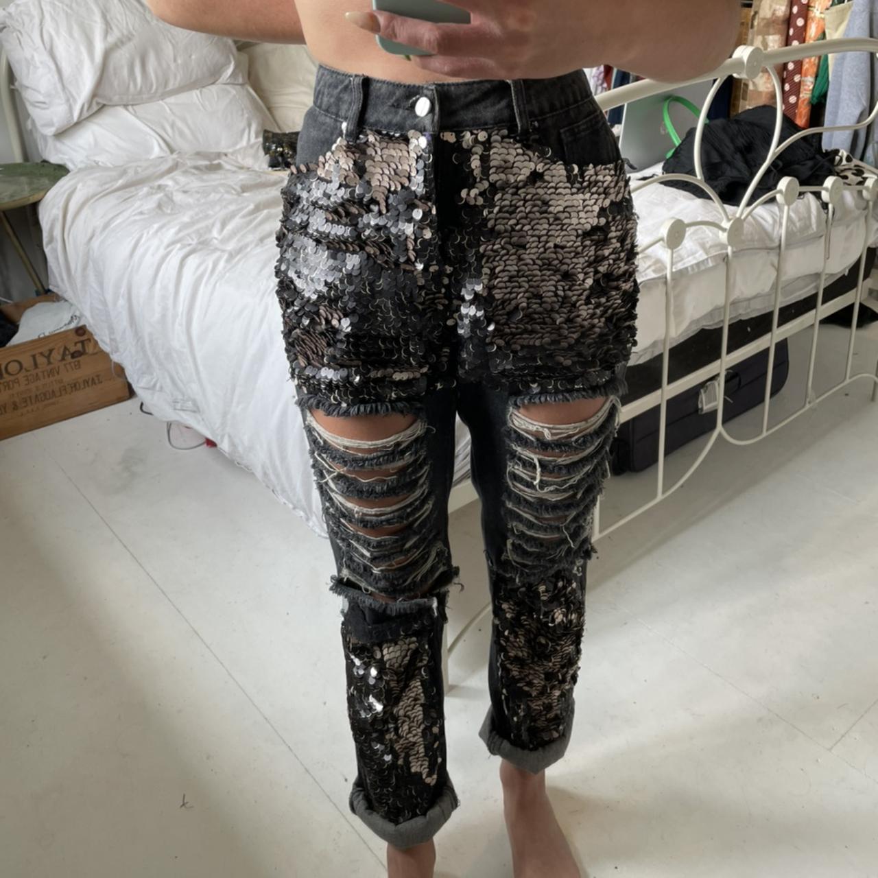 Silver and black sequin jeans with rips in the... - Depop