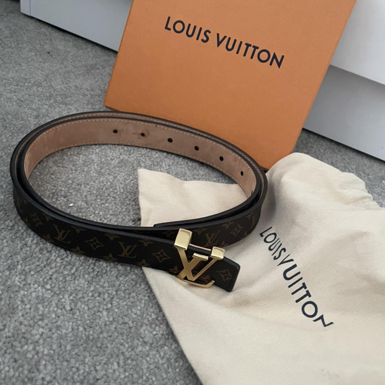 Louis Vuitton belt. Black and Grey with gold emblem. - Depop
