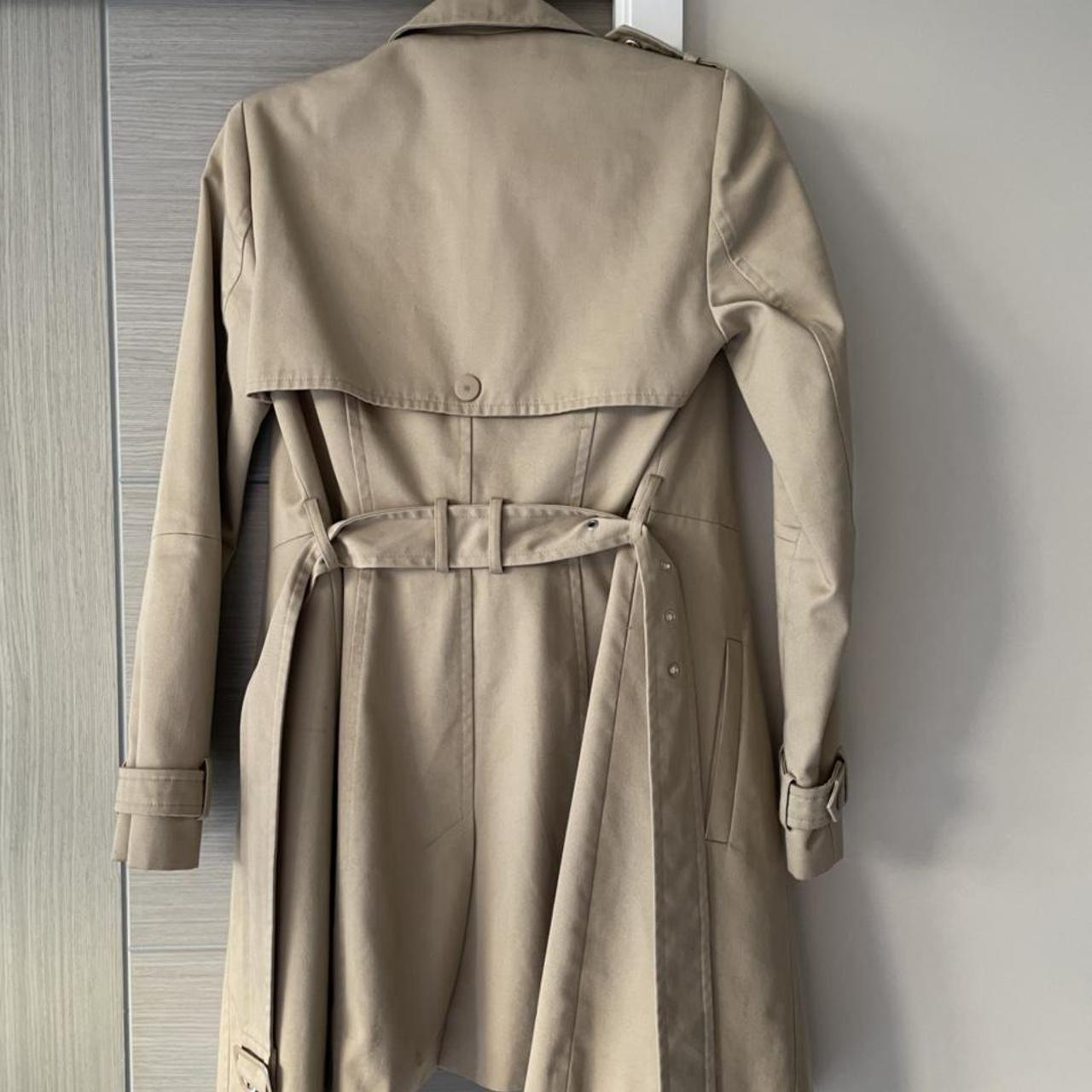 Ladies beige fitted trench coat. Size 8. Warehouse.... Depop