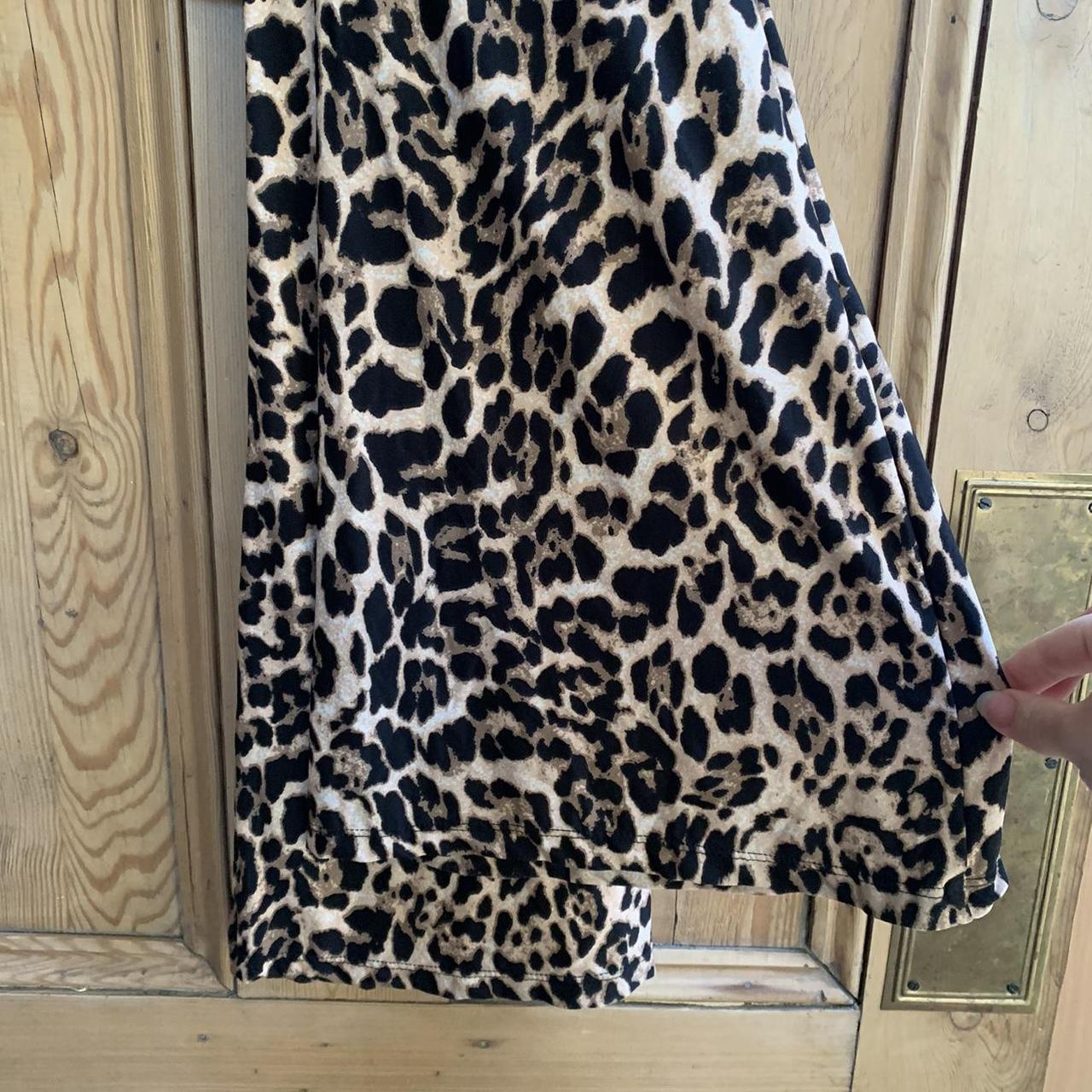 Urban Outfitters Cheetah print flared trousers. - Depop