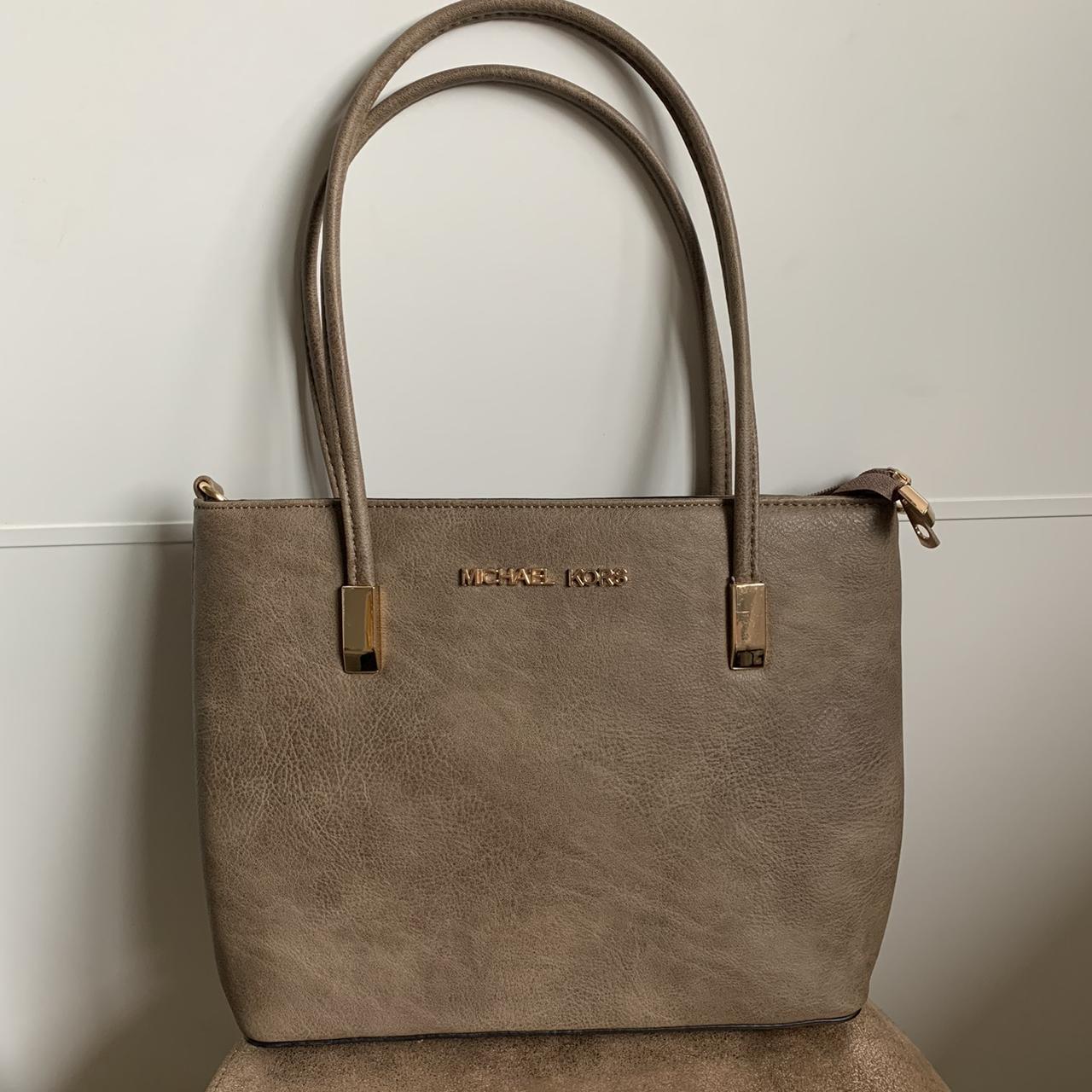 Grey/taupe Michael Kors bag. Straps long enough to... - Depop