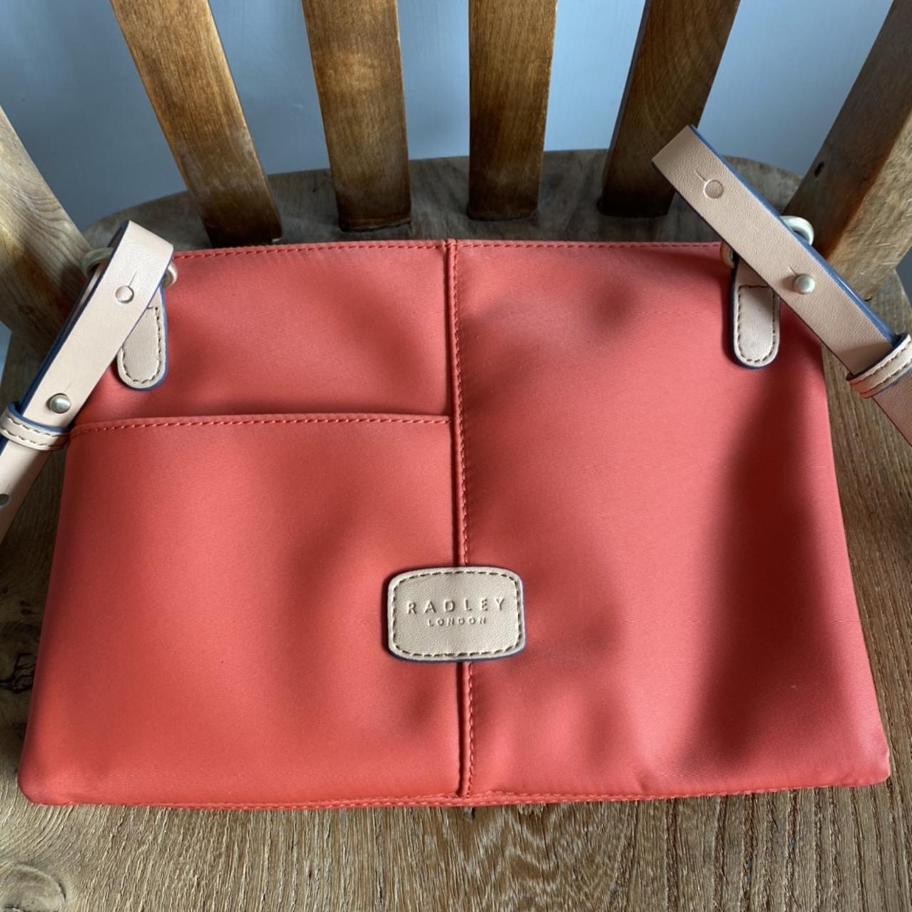 Radley pink crossbody online bag