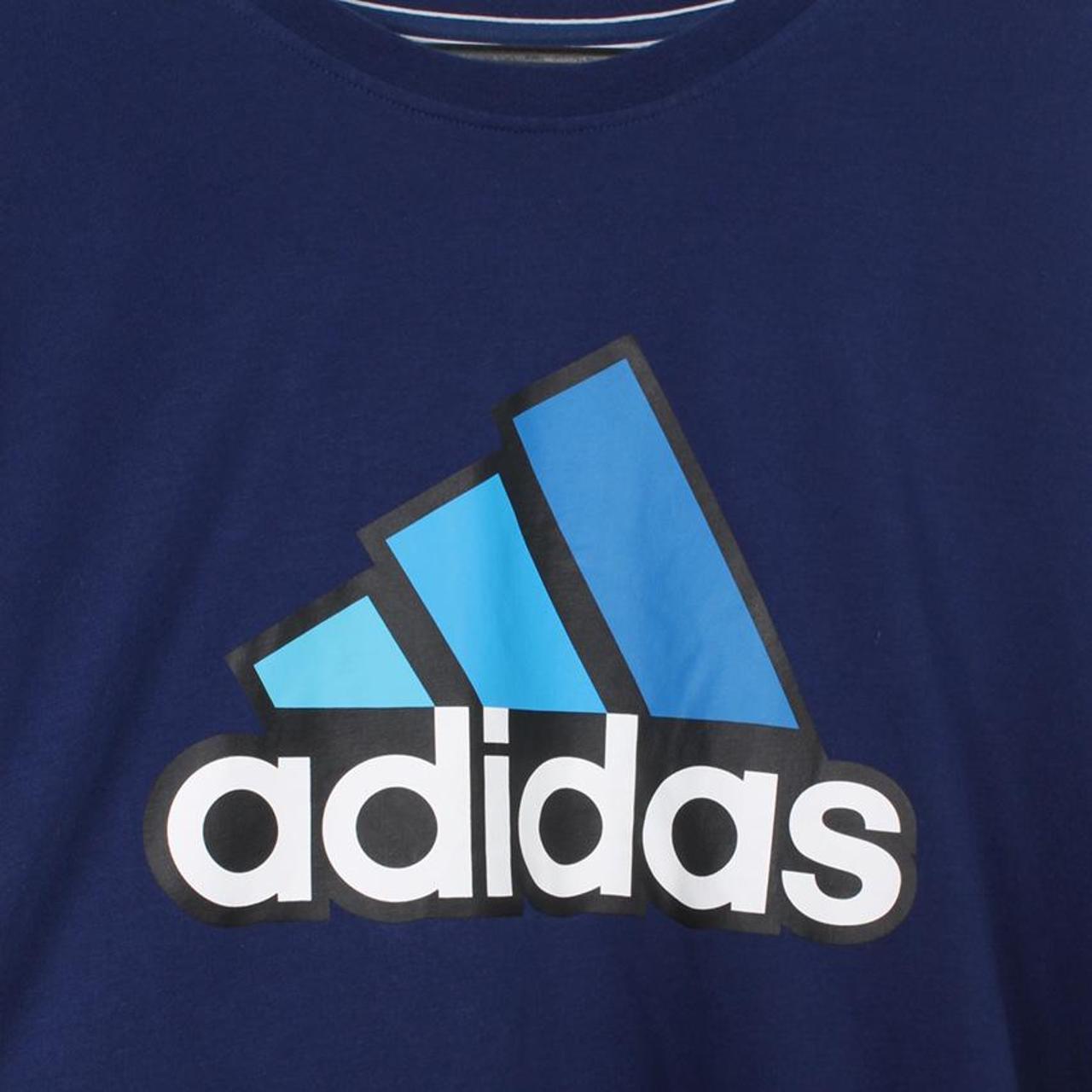 Adidas tee in navy blue with central print spell out... - Depop