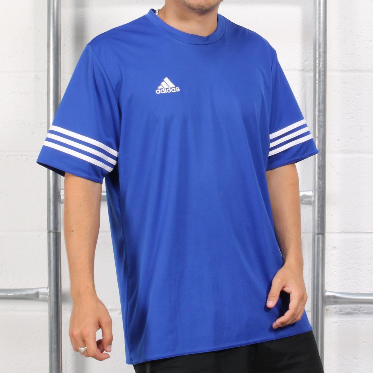 Adidas tee in blue with embroidered spell out logo.... - Depop