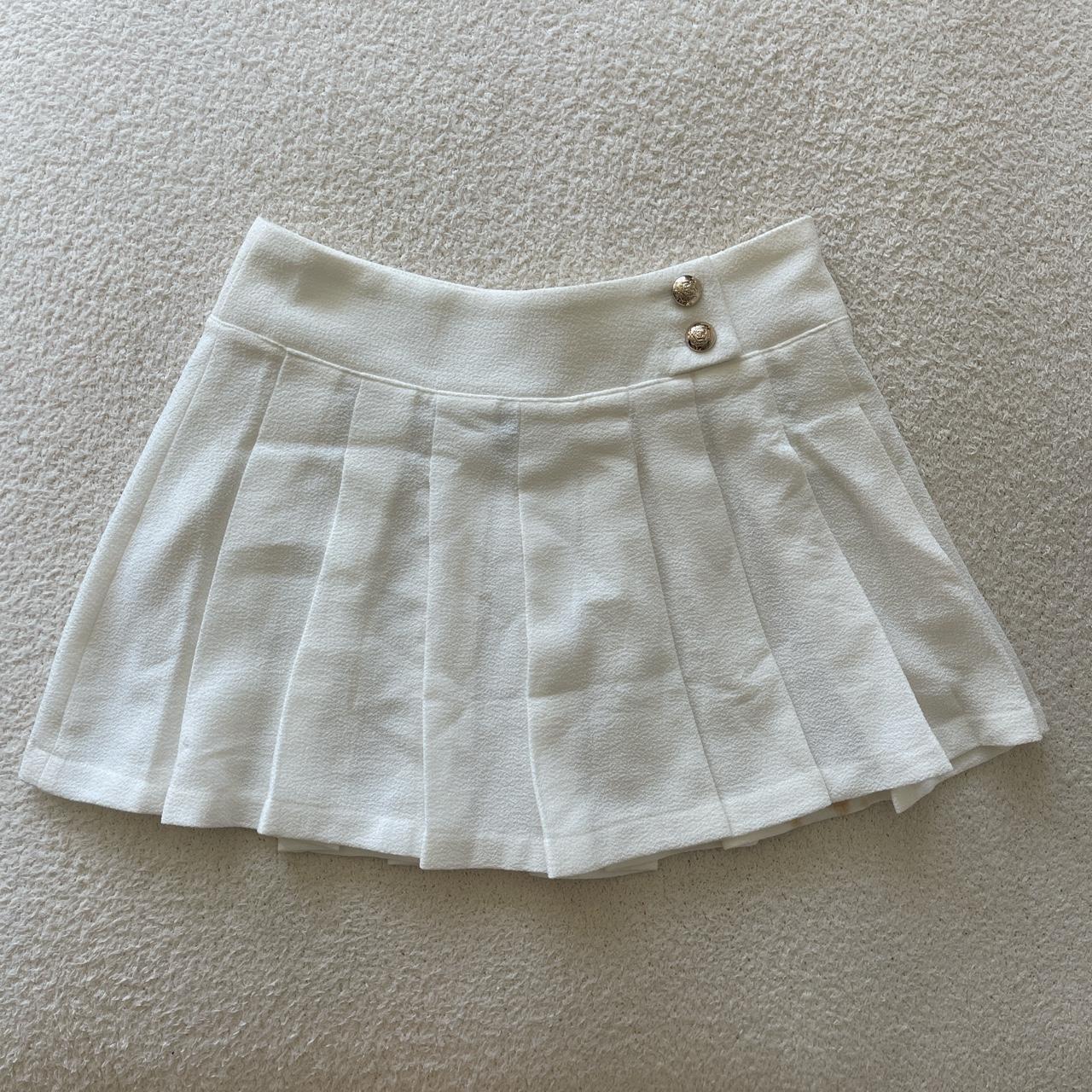 Cher skirt from Bamba Swim in white with gold... - Depop