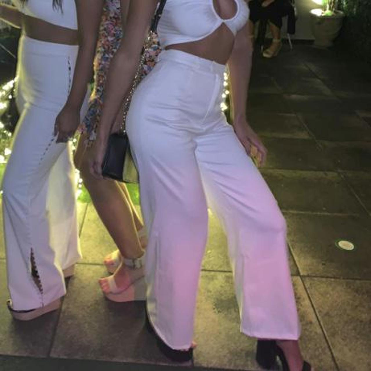 White going out pants had belt holder details... Depop