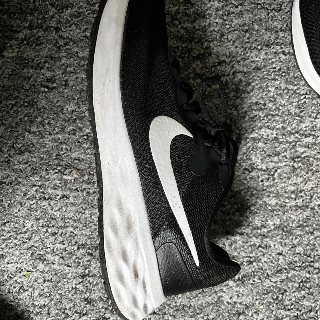 black nike trainers men