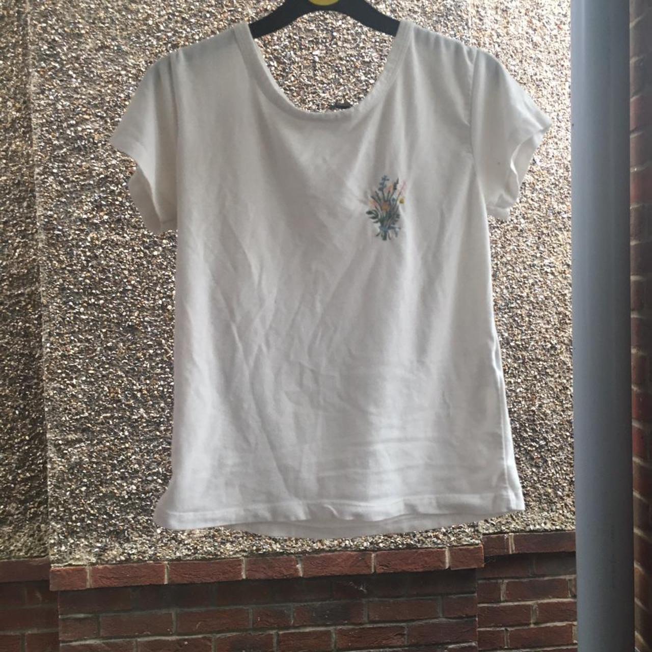 Cute brandy Melville baby tee in white, with little... Depop