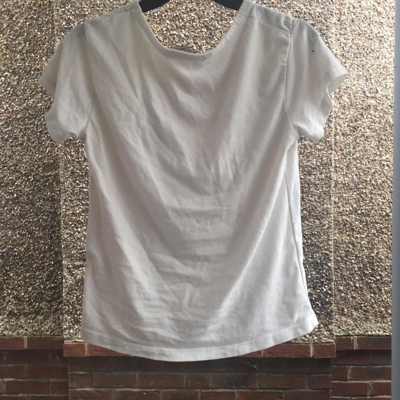 Cute brandy Melville baby tee in white, with little... - Depop